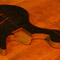 Neck pocket and scroll of an ebony and walnut bass