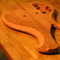 Body bevel on back of a mahogany bass