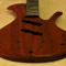 Xylem single-cut mahogany custom bass with oil finish
