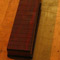 Bois de Rose fretboard on a bass neck