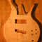Flamed maple and mahogany bass after carving