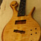 Curly maple top on a Xylem custom bass
