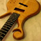 Xylem scroll, maple top and ebony fretboard on a custom bass