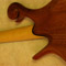 Maple neck, ebony shim and mahogany body on back of a Xylem bass