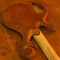 Maple neck and mahogany body of a 5 string custom bass