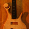 Custom bass with ebony fretboard and flamed maple top