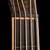 Headstock, inlaid maple Xylem logo, Sperzel locking tuners and truss rod cover of the bass guitar