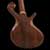 Closeup of the ebony nut, maple bound fingerboard and truss rod cover of the custom bass