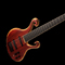 Xylem 6 string blood wood bass in playing position