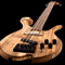 String-thru plate on a Xylem custom bass with top-loaded low E string