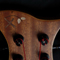 Closeup of Xylem logo inlay and headstock of the bass along with Gotoh tuners