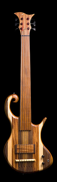 Xylem 6 string fretless bass of mahogany and other woods with an EMG pickup and Gotoh tuners.