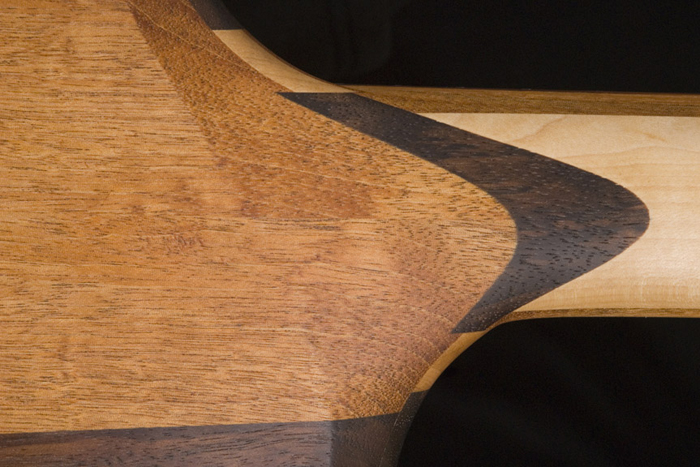 Neck joint of the custom bass w/ black walnut neck shim