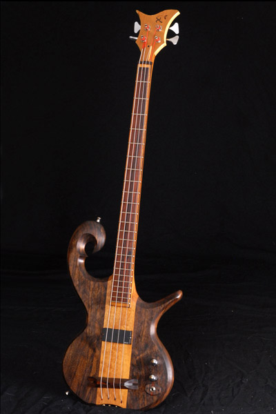 Full front of the custom 4 string bass guitar including EMG-DC pickup, Hipshot Ultralite tuners and 150 year old black walnut body