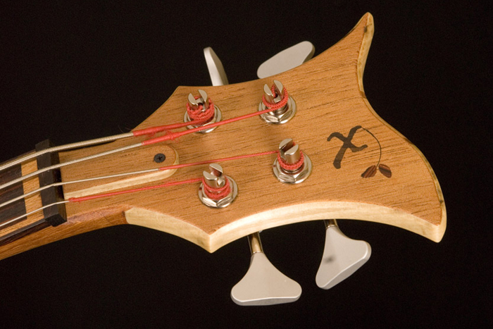 Headstock w/ Xylem logo inlay, Hipshot Ultralite Tuners and truss rod cover