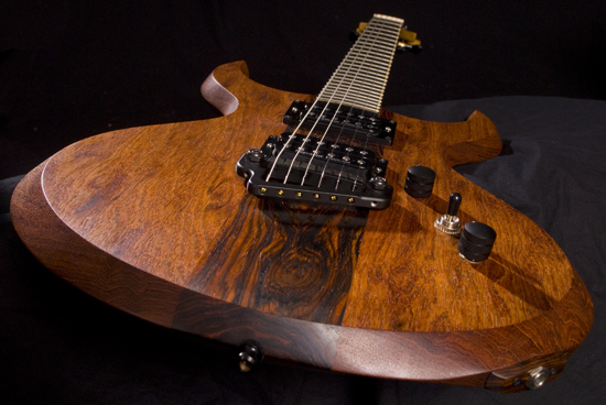 Xylem custom guitar made of Brazilian cherry, cocobolo, ebony and maple with a Hipshot Baby Grand bridge