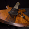 Guitar body front, Hipshot Baby Grand bridge and cocobolo center stripe