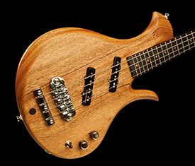 Xylem single cut custom bass in playing position