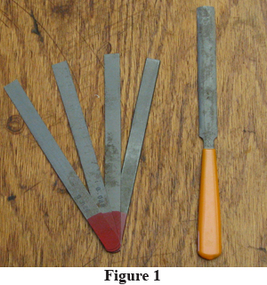 A set of gauged nut files for slotting a guitar or bass nut