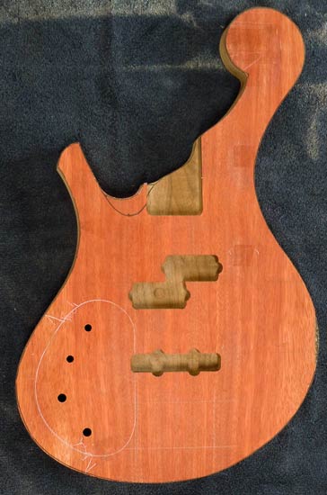 Lefty custom bass body with bloodwood top