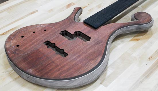 Custom bass build with ebony fretboard, bloodwood top, walnut body