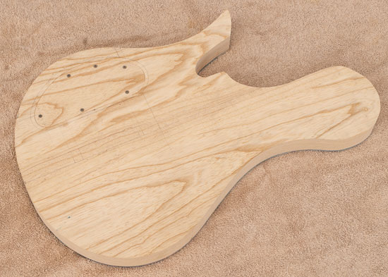 Single-cut custom bass build with swamp ash body