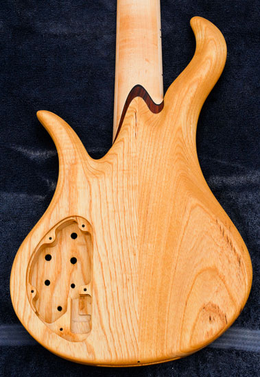 Custom bass body made of swamp ash w/ control cavity route