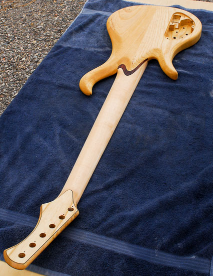 Swamp ash 6-string bass guitar body being built