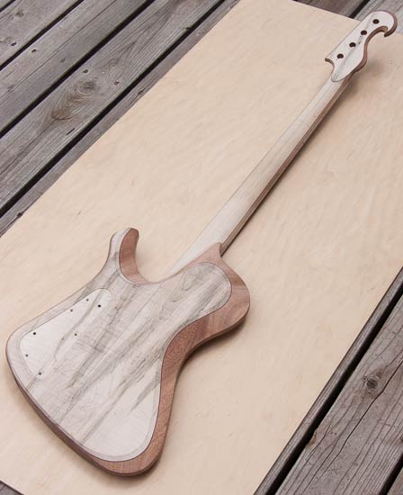 Contoured body of a Thunderbird-style custom bass