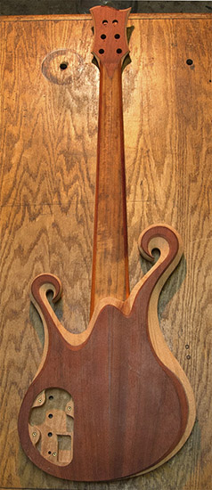 Custom 6-strng bass with ebony fretboard, Delano pickup routes, carved, back