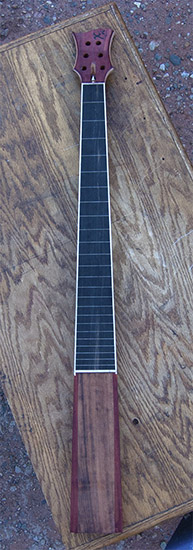 6-string custom bass neck with ebony fingerboard, maple line markers