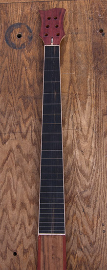 6-string fretless bass neck with line ebony fretboard, maple binding