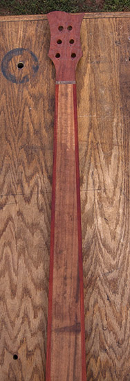 6-string fretless bass neck with tigerwood core, padauk stringers, back