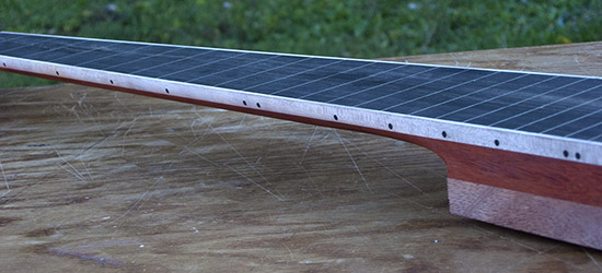 Fretless 6-string bass neck with line markers