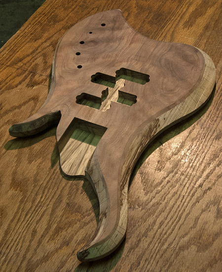 Dual P-Bass with walnut top, black limba core