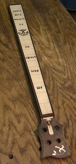 Custom bass neck with ebony custom inlays