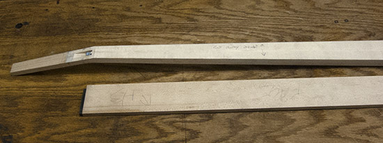 Maple neck and fretboard of a four-string custom bass