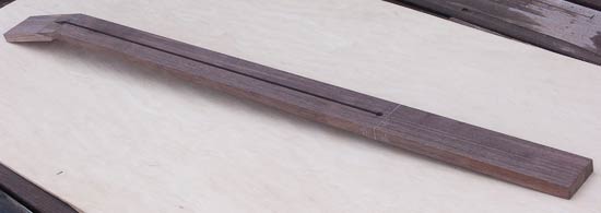 Thru-neck blank for a bass with truss rod channel routed out