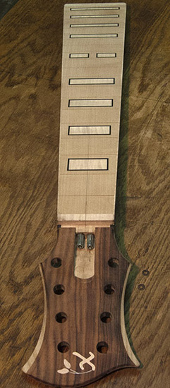 8-string bass neck with rosewood headstock, flamed maple block inlays
