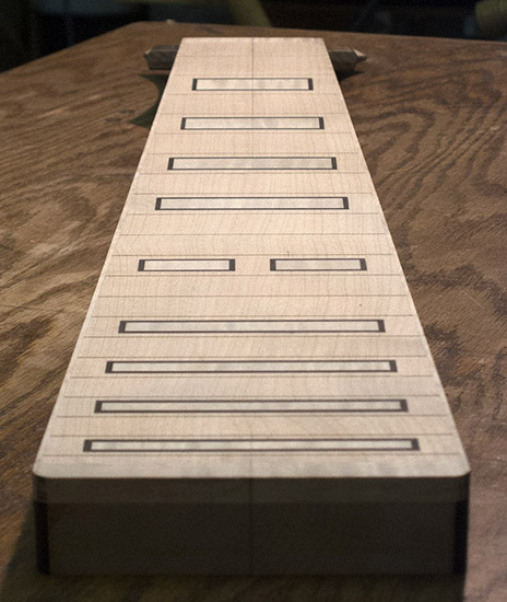 8-string bass neck with ebony and maple block inlays, heel