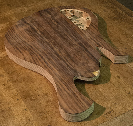 8-string custom bass body with book-matched Patagonian rosewood top