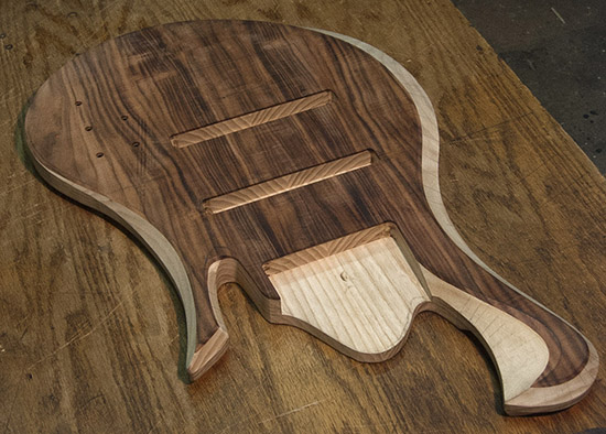 Ash 8-string custom bass body after carving