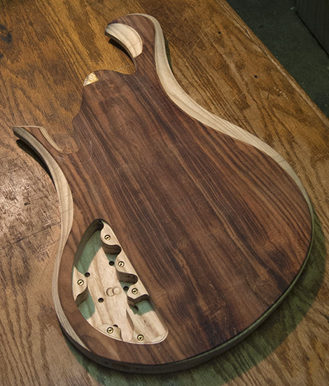 8 string bass guitar with Bartolini preamp routes in control cavity