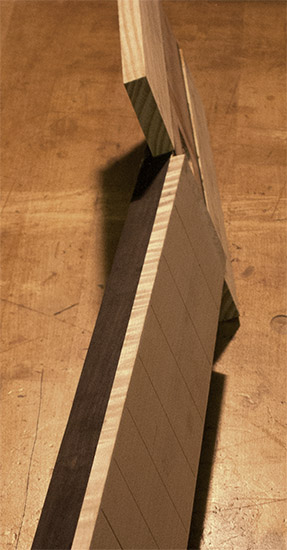 8-string bass guitar neck with ebony stringers, flamed maple binding