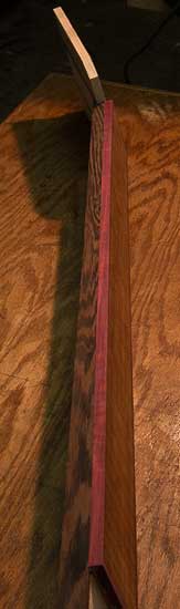 Purpleheart binding and wenge laminates on a 7-string bass neck