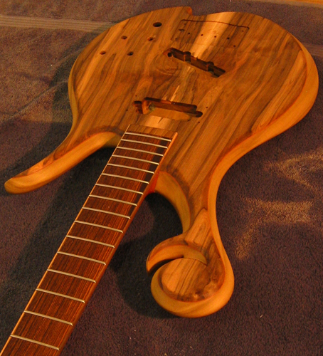 Oiled scroll on a Xylem custom bass
