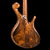 Lefty bass guitar with Peruvian walnut top, maple accents