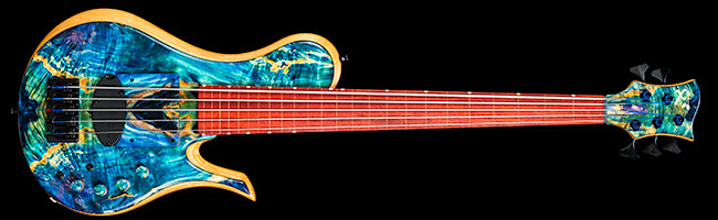 Fretless bass with blue burl radius ramp, single-cut shape