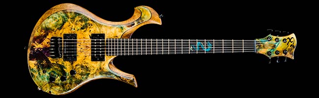 Custom guitar with colored buckeye burl top, exotic shape
