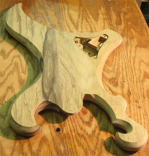 The back of the seven string guitar after carving